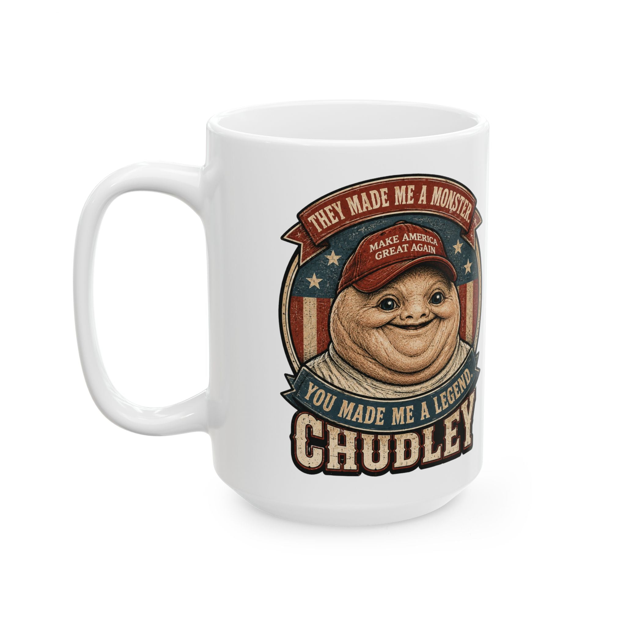 A white ceramic mug featuring a vintage-style graphic of the character Chudley from Superbad, wearing a red cap with an American flag pattern and surrounded by text that reads 'THEY MADE ME A MONSTER' and 'YOU MADE ME A LEGEND'.